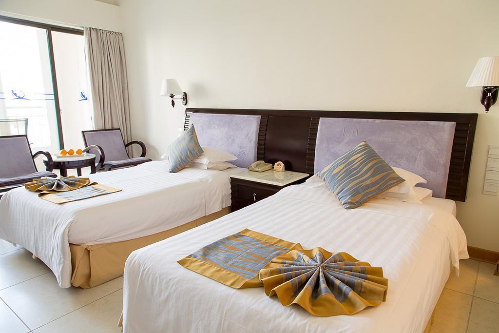 Landscape Beach Hotel Sanya Quarto foto